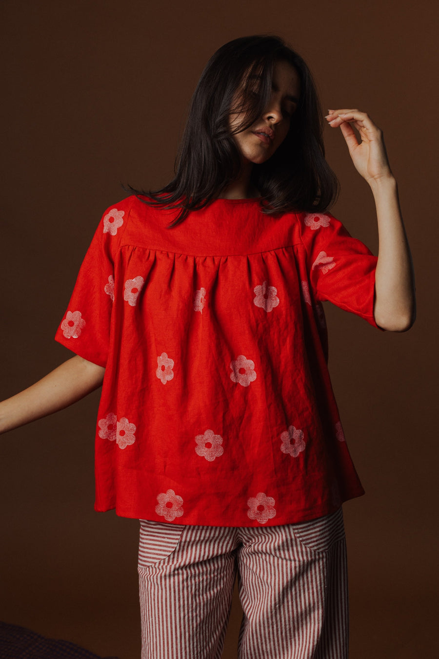 Front view studio photo highlighting the generous gathers under the front yoke seam and easy drape of the Claire Blouse.
