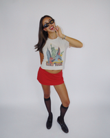 Model wearing Fruit Face NYC baby tee with New York graphic