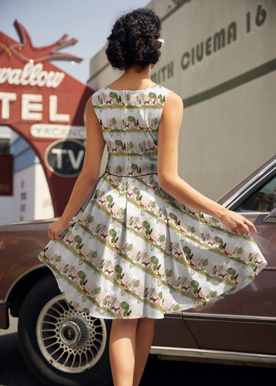 Back view of the Retrolicious Elizabeth Dress in Woodland Sunset showing the sleeveless cut, fitted waist, and full flared skirt.