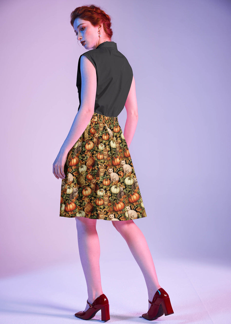 Three-quarter back perspective showing the back waistband and fit of the Retrolicious A-line Skirt.