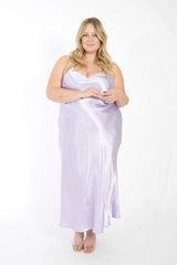Front view of a blonde model wearing the lavender purple Best Curve bias cut bamboo slip dress.