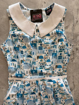 Flat lay detail of the Retrolicious Santorini dress bodice featuring the white contrast Peter Pan collar, waist piping trim, and brand tag.