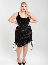 Model wearing The OG Game Changer Black Sequin Dress by Renee Cafaro, a size-inclusive sequin dress designed for special occasions and evening wear.