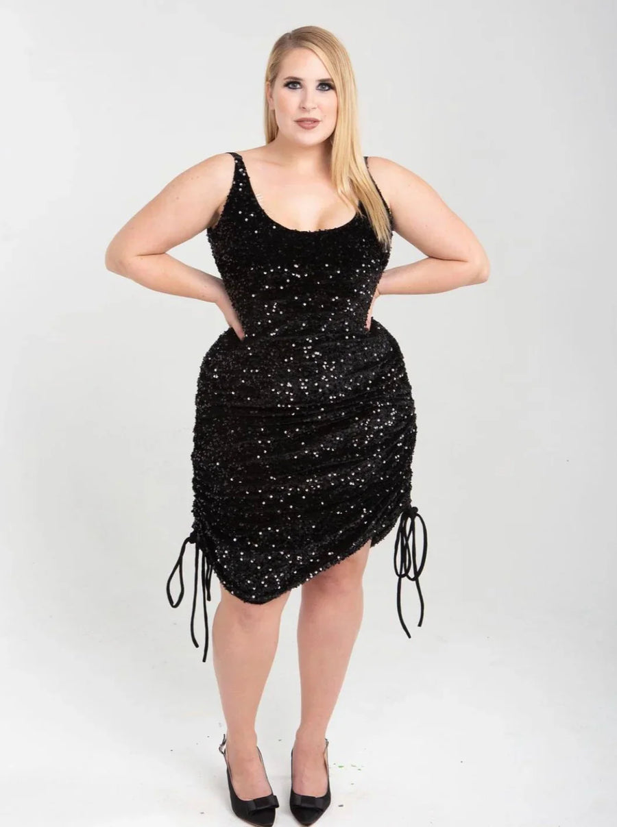 Model wearing The OG Game Changer Black Sequin Dress by Renee Cafaro, a size-inclusive sequin dress designed for special occasions and evening wear.