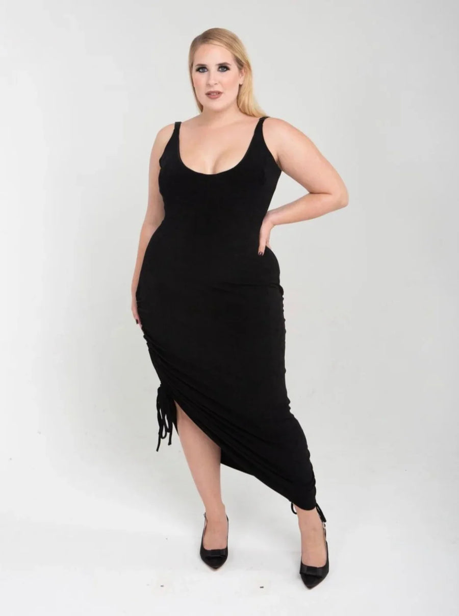 Model wearing The OG Game Changer Black Dress by Renee Cafaro, a size-inclusive black dress designed for comfort, versatility, and everyday elegance.