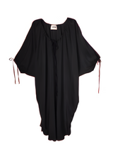 Studio flat lay product display of the Baacal Maxine Kaftan in black showing its wide kimono sleeves and drawstring neckline.