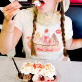 Model wearing Fruit Face Fruit Boat baby tee with ice cream graphic