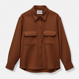 Studio flat lay shot of the Baacal Payton Shirt Jacket in terracotta brown showing chest flap pockets, collar, and front button closure on a light grey background.