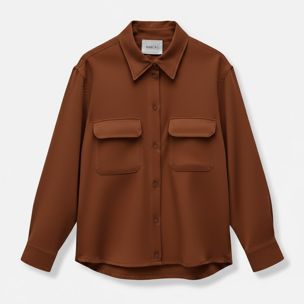 Studio flat lay shot of the Baacal Payton Shirt Jacket in terracotta brown showing chest flap pockets, collar, and front button closure on a light grey background.
