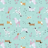Close-up pattern detail of the Retrolicious Dogs print featuring poodles, dalmatians, corgis, and dachshunds on a mint green background with small flowers.