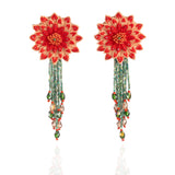 Front view of the Fyoli Fyoli DAHLIA Embroidered Earrings in Coral Red on a white background. The intricate 3D flower design features hand-embroidered petals and a long, flowing iridescent green glass bead fringe.