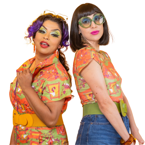 Close-up portrait of two models showcasing retro 70s hair, makeup, and vintage sunglasses styled with the Blue Platypus Brownstone Betties print.