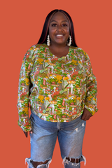 Front view of a model wearing the Blue Platypus Magnificent Mushroom Pullover in Olive French terry fabric paired with jeans.