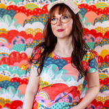 Close-up view highlighting the scoop neckline and tulip sleeve detail on the Blue Platypus Mint & Strawberry Meadow printed shirt.