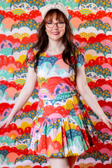Full studio shot showing the Blue Platypus Tulip Sleeve Top paired with a matching Mint & Strawberry Meadow tiered skirt.