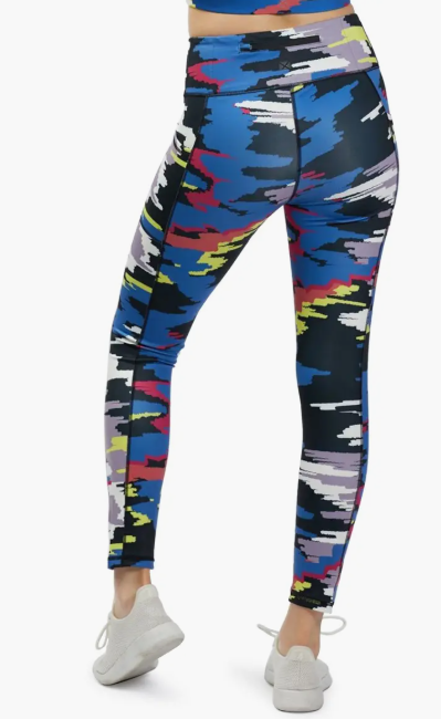 TomboyX Streamline 7/8 Legging Disruptor colorful camo pattern back view on a model