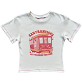 Front flat lay view of the Fruit Face Just Passing Through Off-White Baby Tee with red graphic print and red contrast stitching.