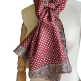 Fyoli Fyoli BINDU Tassar Silk Stole tied in a knot on a dress form mannequin highlighting the Aipan spiral border print.