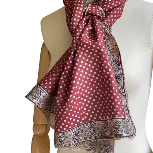 Fyoli Fyoli BINDU Tassar Silk Stole tied in a knot on a dress form mannequin highlighting the Aipan spiral border print.