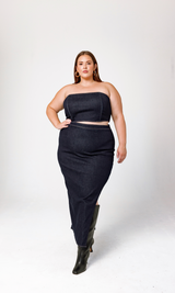 Profile stance showing the structured bodice and silhouette of the GIA/irl Isabella Denim Dress