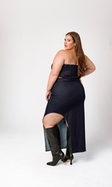 Side angle view highlighting the asymmetric hem and leg slit of the GIA/irl Isabella Denim Dress.