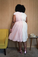 Tamara Malas Penelope Dress Pink and White textured pleated button down full body back view on size inclusive model