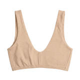 Proclaim Organic Cotton Everyday Bralette in Ada Nude, showcasing the wireless deep scoop neckline design . Flat lay product view.
