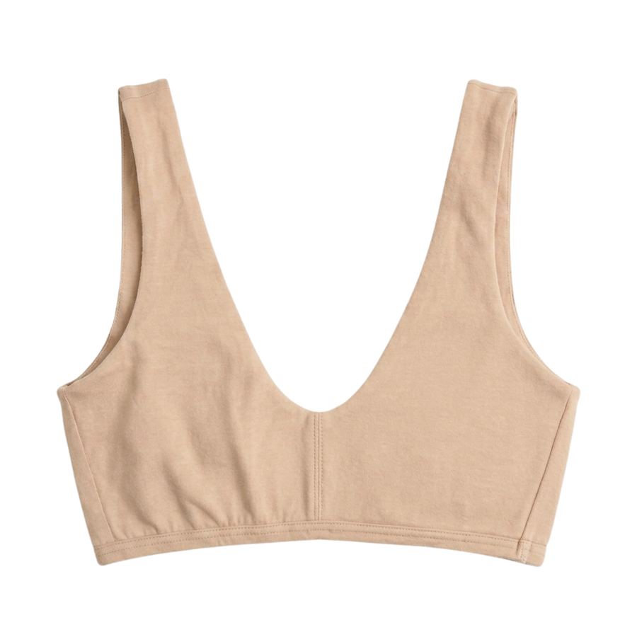 Proclaim Organic Cotton Everyday Bralette in Ada Nude, showcasing the wireless deep scoop neckline design . Flat lay product view.