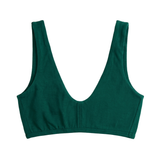 Proclaim Organic Cotton Everyday Bralette in lagoon green, showcasing the wireless deep scoop neckline design . Flat lay product view.