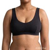 Proclaim Organic Cotton Everyday Bralette in black, showcasing the wireless deep scoop neckline design .  