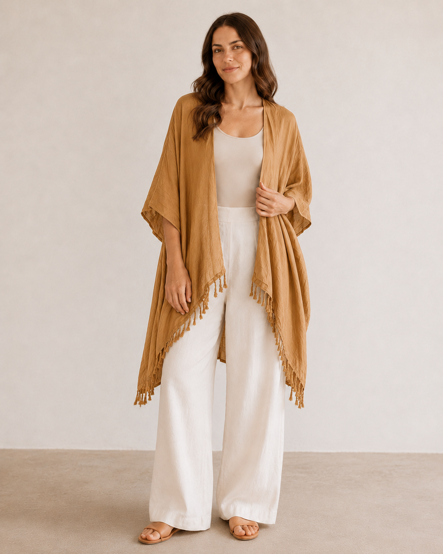 Model wearing the Desert Gold mustard-toned Village Thrive Rayon Kimono.